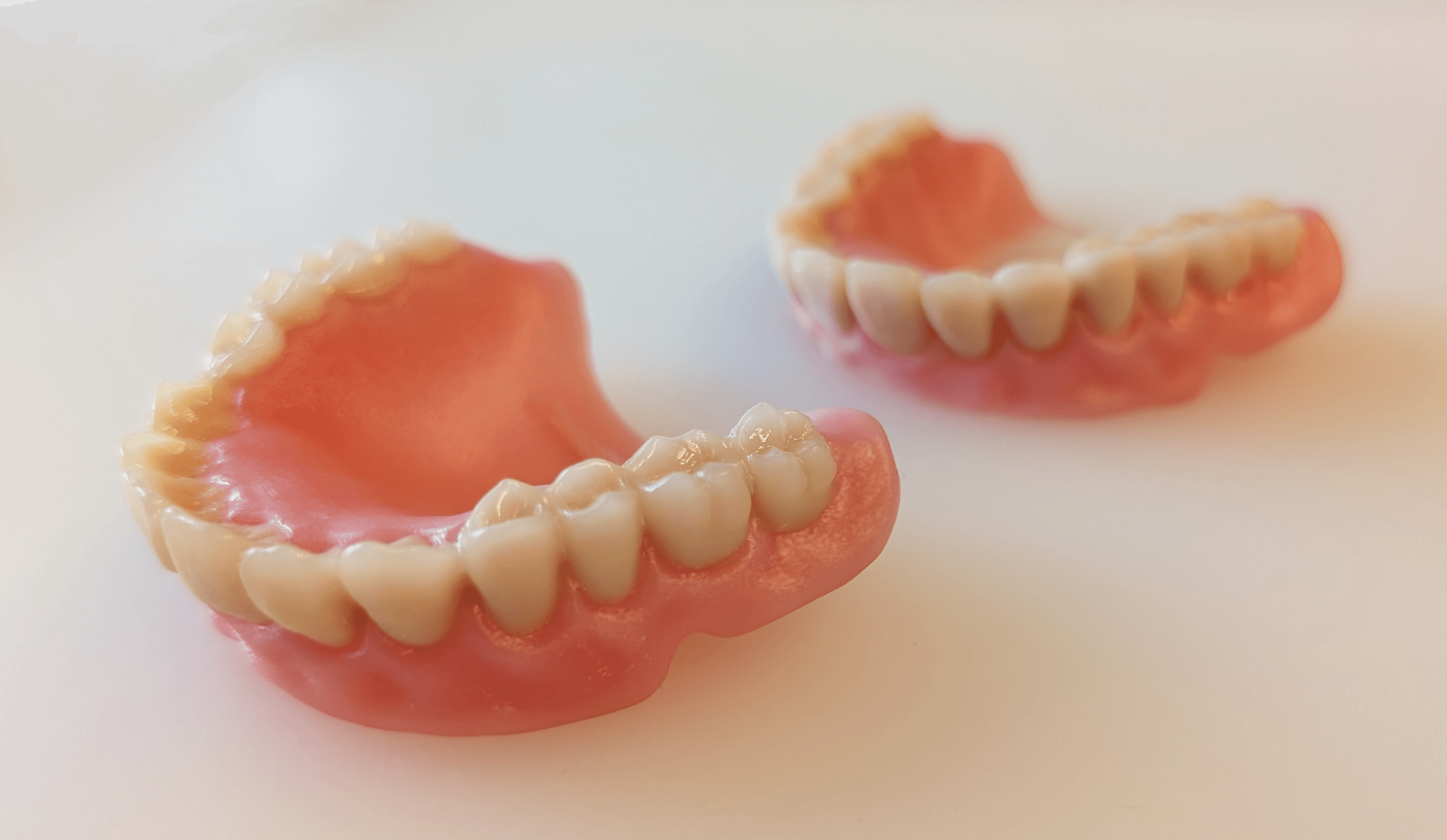 Novenda 3D printed denture materials showing natural teeth and gums